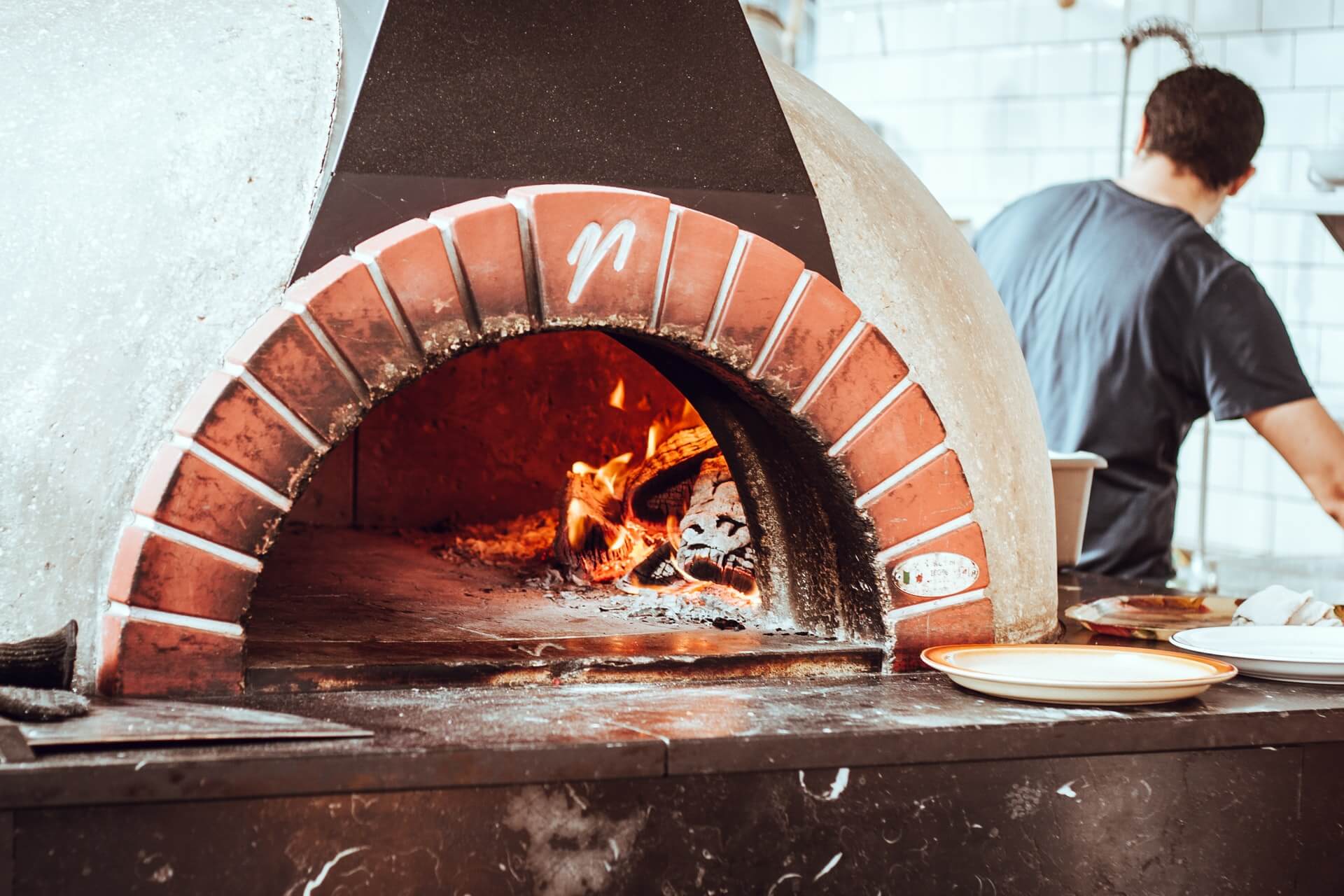 Reasons Your Backyard Needs a Wood-Fired Pizza Oven
