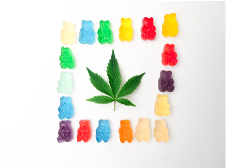 Assorted gummies with cannabis flower